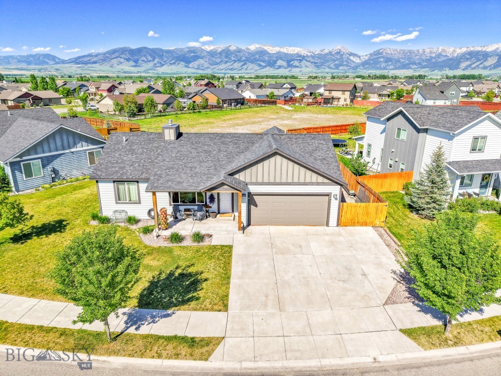 NEWLY REFRESHED BACKYARD!! FRESH INTERIOR PAINT!! SELLERS ARE OFFERING A 1% CREDIT TO BUYERS AT CLOSING! Don't miss out on this adorable 3-bedroom, 2-bathroom single-level home situated on a nice lot with stunning Bridger Mountain views! Inside, you'll find a gas fireplace, vaulted ceilings, and mountain views from both the kitchen window and patio door. The primary bedroom includes a walk-in closet and a spacious en suite with tiled bathroom. A large garage provides ample storage and parking.
This home is fully equipped as a smart home with a comprehensive Honeywell system featuring multiple wired and RF zones. Every room has been pre-wired with speaker wire, 2-4 Cat 6 cables, and coax run to each outlet. Built-in speakers are already installed in the living room, rear porch, and garage, with additional locations like the kitchen, master bedroom and bath, and front porch pre-wired for easy future speaker installations. The home also includes Cat 6 wiring in the soffits throughout for optional security camera installation.
The fenced backyard is equipped with multiple raised garden beds featuring an assortment of fruits and vegetables, plus an underground sprinkler system for both front and back yards. Additional features include a radon mitigation system. Ryen Glenn Subdivision is a community in a great location that includes sidewalks, a large park, playground, and covered picnic area for your outdoor activities! You'll enjoy close proximity to Bozeman/Yellowstone International Airport, Montana State University, and Bridger Bowl. Call your favorite realtor today for a private showing and see it for yourself!