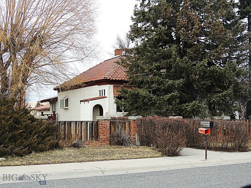 Looking at all offers. This is a unique property with an Old World feeling. This property has a lot of potential and needs some work;perfect for a handyman with a vision. The main floor consists of a cozy kitchen with a wood stove, familyroom, full bath and master bedroom.The upstairs can be a bedroom or office with its own bathroom. The basement has a large multi purpose room besides the two bedrooms. The large wood stove has not been used by the prior owner but may be a great option providing alternative heat. The two car garage also has a separate workshop with 220V hookup and a wood stove to keep you toasty while doing projects. The courtyard is ready to become the place for BBQ's and gatherings with family and friends. Call your Realtor today for a showing and bring us an offer.