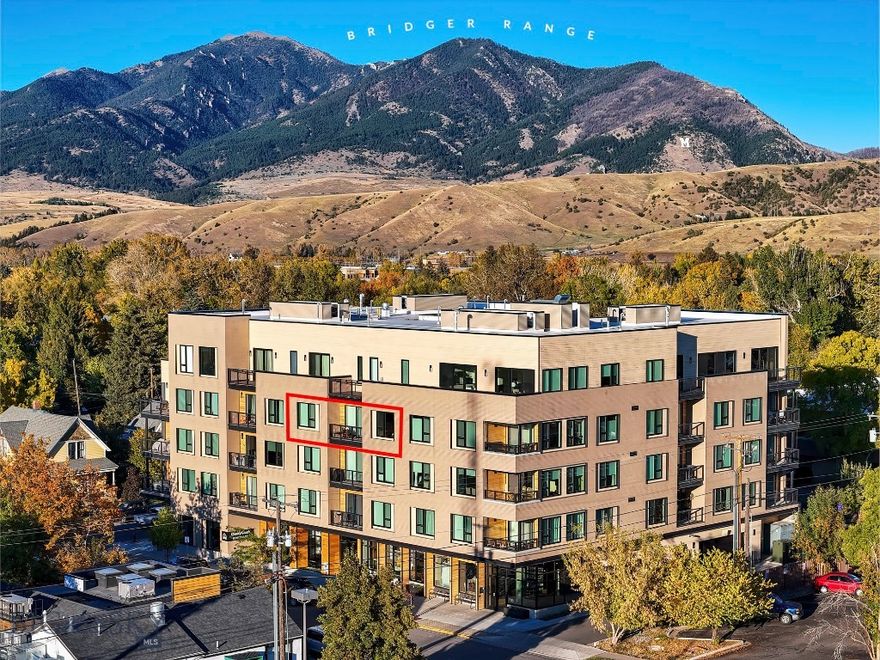 What’s not to love about this pristine, top-floor residence in the hip Merin — right in the heart of Downtown Bozeman! This bright and airy 2-bedroom, 2.5-bath residence combines modern design with high-end appliances including three LG flat-screen mounted televisions as well as high-end finishes, offering an exceptional upper-floor location, generous living space, and abundant storage. Just two blocks from the vibrant pulse of Main Street, you’ll be steps from Bozeman’s best restaurants, coffee shops, boutiques, and fitness studios — the perfect setting to live connected and engaged! Your vehicle stays cozy in the heated, climate-controlled garage with access to the City Lift parking system, while secure building entry ensures peace of mind. Internet and cable connections are provided in the HOA suite of services. Relax and recharge on the Merin’s fantastic second-floor outdoor courtyard — ideal for taking in those spectacular Bridger Mountain views — or unwind on your own private balcony, soaking in the warmth of the afternoon sun as it sets in those signature Montana hues. Urban energy meets mountain lifestyle here at the Merin — and this is the one you’ve been waiting for.  Let’s go!!