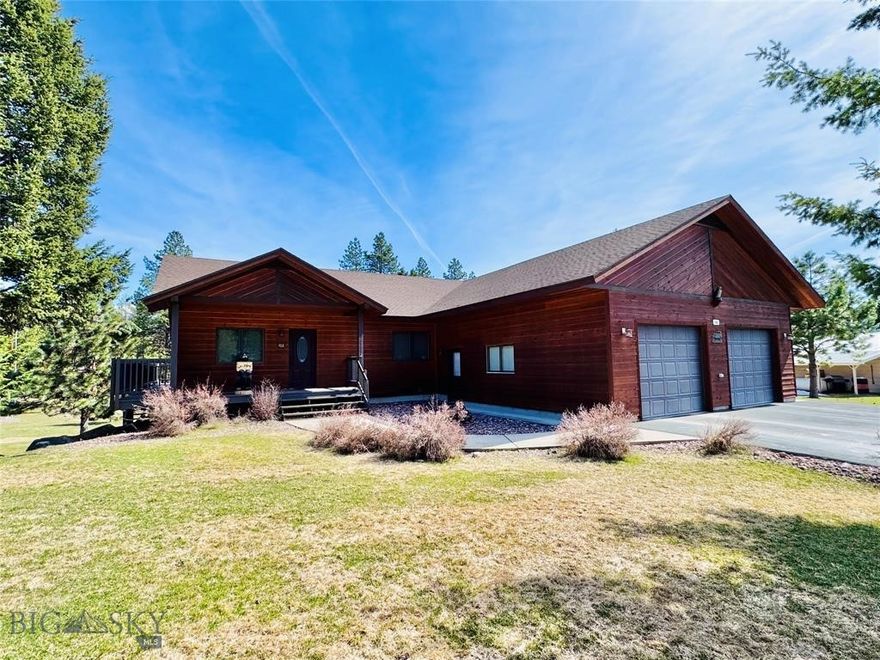 Meticulously well-kept Linford built custom home on two-lots with a heated 2 1/2 car attached garage, and a 30' x 56' detached 3-bay heated shop with lots of room for your vehicles or toys. There are spectacular Swan Mountain range views from the deck and all of the east facing home windows. The paved driveway has a parking bump-out for your visitors who will be warmly welcomed into your home via the lovely covered front porch. Thoughtfully designed, the entry door from the garage takes you immediately into the laundry room. There is also a convenient access door from the side deck to enter this room. A short hallway leads you to a guest bedroom, or office, or whatever you might want to use this room for. That is followed by full bathroom, and then the owner's suite, complete with its own 3/4 bathroom. The kitchen, dining room, and living room all have beautiful oak flooring, and all of the cabinets throughout the home are oak. The patio doors off of the dining room lead you out onto the expansive deck that is perfect for entertaining, relaxing, or simply overlooking your yard and occasional wildlife visitors. The fully finished walk-out basement has an additional two bedrooms, full bathroom, living room, storage room, and utility room. This area could easily be converted into a its own fully functional living space, as there are kitchen cabinets, kitchen sink, and a refrigerator already in place. The home maintains a constant and even temperature with the zoned in-floor heating. The exit door from the lower-level leads directly into the rear yard and you are then steps away from the detached shop. The south fully enclosed shop bay has in-floor heating and built in work benches. The two north bays are heated by a forced air propane furnace. With the convenient 3/4 bathroom, there may not be a good reason to ever leave the projects you will be able to accomplish in there. If that weren't enough, the garden shed located on the south side of the home provides additional storage. The front yard has an underground sprinkler system keeping your lawn lush and green all summer long. Located less than 1.5 miles from downtown Seeley Lake provides great convenience to all of the in-town amenities, while far enough away to provide peace and privacy. For those aviation enthusiasts, you are close to the airport making this a great base for those wishing to fly in and out of town.