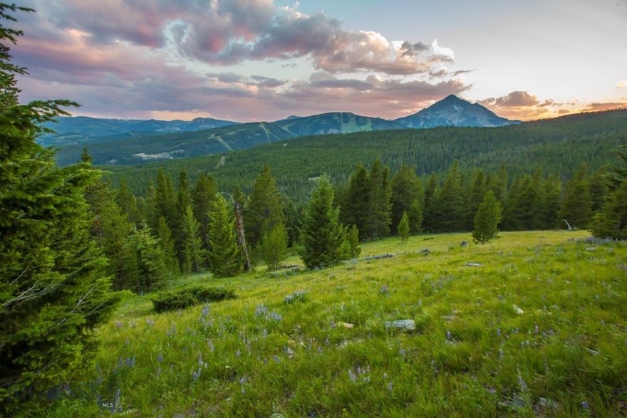 A timeless legacy property in the heart of Big Sky – 320 Acres of Unparalleled Beauty. Nestled in the coveted North Fork corridor of Big Sky, Montana, this extraordinary 320-acre estate offers an exceptional combination of natural grandeur, privacy, and proximity. With sweeping, unobstructed views of the Spanish Peaks, Gallatin Range, Lone Mountain, and Pioneer Mountain, the landscape is as breathtaking as it is rare.
 
This expansive property is bordered by thousands of acres of National Forest, providing direct access to an extensive network of private trails for hiking, biking, and Nordic skiing. The land itself is a rich mosaic of alpine meadows, old-growth forests, and rolling topography—ideal for a private estate, conservation refuge, or refined development opportunity.
 
The majority the property (298 acres) is zoned RCSF 20, which could provide someone the opportunity to create more homesites or consider a conservation easement. The parcel offers a balance of flexibility and long-term preservation potential. All of this is just minutes from the energy of Big Sky’s Town Center and world-class amenities at the base of Big Sky Ski Resort. 
 
A singular offering in scale and setting, this property represents one of Big Sky’s last great private landholdings—an enduring legacy for generations to come.