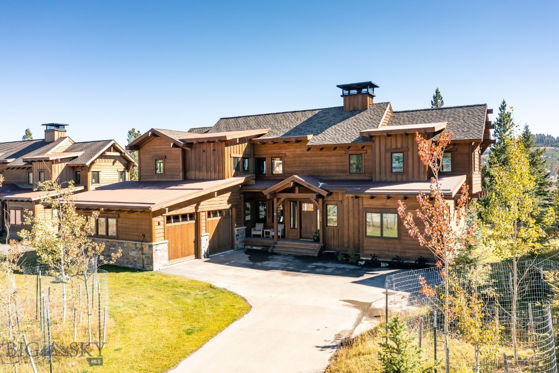 Experience true mountain luxury in this fully furnished Highlands residence, a meticulously maintained and completely turn-key home offering unrivaled ski-in/ski-out access. Designed for both elegance and functionality, this 4-bedroom, 3.5-bath retreat features air conditioning, a two-car garage, a spacious mud/ski room, and a main-level primary suite for ultimate convenience. The expansive south-facing deck spans the length of the home, complete with a covered dining area and a private outdoor hot tub—ideal for entertaining or relaxing after an adventurous day on the slopes. Perfectly positioned within the community, you’ll be within walking distance to the Montage Big Sky hotel and the Spanish Peaks Clubhouse, while also enjoying seamless access to an extensive network of trails for skiing, hiking, and biking. A Golf or Ski Social membership at Spanish Peaks Mountain Club is available with this property; application, approval, and deposit are required prior to closing.