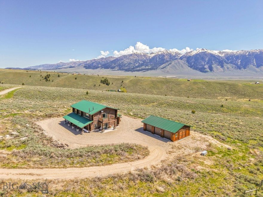 Experience the best of Montana’s wild beauty and recreation at 23 Lake Trail in Cameron. This stunning log home sits on two expansive 20-acre parcels, offering 40 total acres of privacy, space, and truly exceptional views of the Madison and Centennial Mountain ranges. The property borders a large private ranch protected by a conservation easement, ensuring unspoiled vistas and lasting privacy.  While the original structure was constructed in 2002 the home saw extensive renovation in 2015 along with the construction of the garage/ shop at that time.  
The home’s exterior logs underwent professional restoration in the fall 2024, showcasing a beautiful blend of rustic charm and long-lasting durability. The main floor is spacious and features an open layout with designated areas for dining, relaxing, and reading, along with a large pantry for ample storage. The upper level is designed to comfortably accommodate guests, featuring an open-concept layout with a kitchenette, perfect for extended stays or entertaining family and friends. A generous three-car garage offers plenty of space for all your recreational gear.
Located within the Madison River Ranches subdivision, owners enjoy access to over 55 acres of shared open space, including private Madison River frontage for world-class fishing and peaceful riverside relaxation. Just minutes away, you'll find trails into National Forest lands, as well as the pristine waters of Cliff and Wade Lakes. Outdoor enthusiasts will also appreciate the short drive to Hebgen Lake, Henry’s Lake, and the west entrance to Yellowstone National Park.
Whether you're seeking a private getaway, or a legacy property to share with future generations, 23 Lake Trail is a rare opportunity to own land with unparalleled views, abundant wildlife, and endless outdoor recreation at your doorstep.