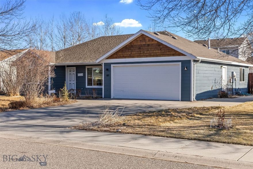 Welcome to 60 Jackson Lane, a comfortable and inviting 3-bedroom, 2-bath single-level home tucked away on a quiet street in the heart of the River Rock community. With 1,288 sq ft of thoughtfully laid-out living space, this ranch-style home offers an easy, livable floor plan designed for everyday comfort.

The open living, dining, and kitchen area creates a natural gathering space, while the private primary suite features a walk-in closet and full bathroom. Two additional bedrooms and a second full bath provide flexibility for guests, family, or a home office, making the home feel both functional and welcoming.

Step outside to a fully fenced backyard with deck and patio space, perfect for summer evenings, pets, or simply enjoying the Montana air. An attached two-car garage adds convenience, and the River Rock neighborhood offers parks, playgrounds, ponds, trails, and a community clubhouse just minutes from your door. Close to schools, shopping, and easy I-90 access, this home offers a relaxed lifestyle in a well-loved Belgrade neighborhood.