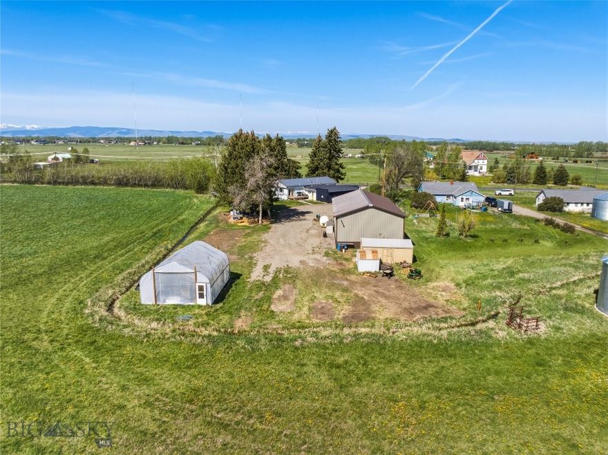 Rare live/work opportunity on .71 acres with no covenants and no HOA. This 3-bedroom, 2-bath home includes a dedicated office space, ideal for working from home or running a small business. The property features a spacious 30x56 shop equipped with 220V electric, offering ample room for equipment, storage, or hobbies. A 20x20 high tunnel provides an excellent setup for year-round gardening or small-scale growing. Enjoy the flexibility to park trailers, vehicles, or operate your business with fewer restrictions—all while having the comfort of a functional residential layout.