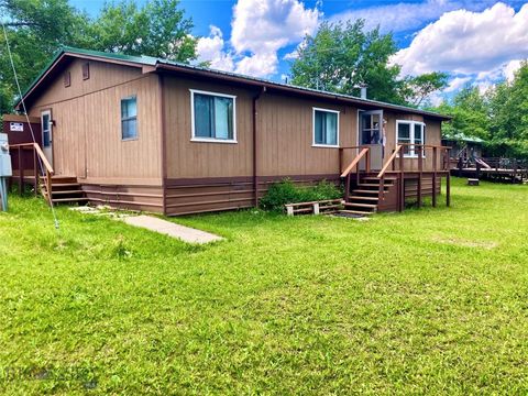 Photo of 28 W Shore Road, Babb, MT 59411 (MLS # 409145)