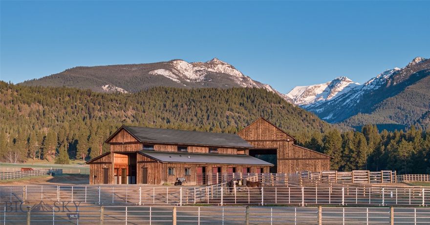 Efficient and compact in a setting that rivals some of the best in the West, Hart Bench Ranch sets a new bar for what a hobby operation can be. Situated on an eponymous bench in the shadows of the Bitterroot Mountains’ most scenic peaks lies a near-perfect assemblage of irrigated meadows, riparian-influenced gullies, and a complete set of operational and residential improvements. With views of Trapper Peak and the most impressive prominences in the southern Bitterroot Range, the 2,895± square foot main home sits to the south of the Ranch’s improvement cluster. Constructed in 2001, the log home imbues turn-of-the-century charm, reminiscent of some of the West’s most adventurous eras. A guest home, two-car garage, two large shops, a greenhouse, and a Western-style saloon complement the residential components.Supporting the agricultural operation, the ranch boasts a new, 9,288-square-foot hay barn with equipment storage and a five-stall horse barn with wash station, tack, and vet room. With 58± acres under irrigation, the ranch provides sufficient feed for livestock. Nearly five miles of new split rail fencing tie it together, creating several pastures, paddocks, and perimeter enclosure. Recreationally, the ranch is home to deer and elk, and fishing is available in the pond.Two stems of the Bitterroot River flow nearby, creating the main channel just north of the ranch. There are multiple access points locally into the Selway-Bitterroot Wilderness, one of the largest roadless areas in the lower 48, providing a vast array of recreational opportunities. Darby, just ten minutes north, is a charming Western town offering staples and dining with Hamilton and its more robust population center and FBO, roughly 30 minutes north. Missoula, Montana’s second-largest metro area, is roughly one hour and thirty minutes to the north. Hart Bench Ranch provides a rare opportunity to own a complete yet manageable operation in a true Western setting.