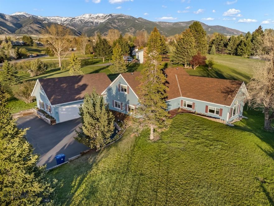 Experience Montana living at its finest with breathtaking Bridger and panoramic valley views from this private 1+ acre property in Wheatland Hills. Adjacent to expansive HOA open space, the setting offers exceptional privacy and a seamless connection to nature.

Inside, the home features an open kitchen with abundant counter space, perfect for gathering and entertaining. A sprawling living room is filled with natural light and anchored by vaulted ceilings and a cozy stove, while an additional family room with a second gas stove provides flexible space for relaxing or hosting. Enjoy the ease of single-level living with a main-floor primary suite, complemented by two additional bedrooms upstairs.

Recent updates include freshly painted exterior (2025), new upstairs carpet, and a whole-house humidifier for year-round comfort. Wildlife is a daily highlight—moose, deer, eagles, bear and more frequent the property—creating a truly special Montana experience. With light covenants, you’ll enjoy the freedom to embrace all that Montana living has to offer.