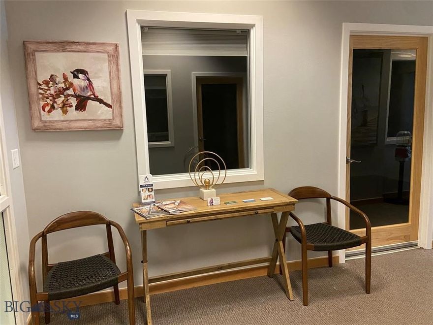 Unit E is home to seven treatment rooms (office spaces) primarily used by wellness practitioners (1,421 sq ft). Many of the offices in this unit are equipped with plumbing for sinks, and there is a washer and dryer hook-up located in a spacious closet at the back of the unit. Each treatment room is thoughtfully designed to accommodate massage tables while ensuring ample space for movement. There is also a kitchenette and small waiting area. Most leases are not long-term, allowing for flexibility as a primary occupant. There are 3 office spaces that have north facing windows. There is a waiting room and common area bathrooms and an elevator to the second floor and air conditioning. This property is great as an investment property or as an owner occupant. A recent unit sold within the building for significantly higher. Great equity opportunity! The homeowners’ association (HOA) is in good standing and has successfully completed significant exterior upgrades. A Furthermore, the property boasts extensive common area parking with over 25 on-site spaces along with ample off-street parking.   Additionally, there is an option to purchase separate spaces: Units F (1,633 sq ft), and G (1,678). All three units are legally distinct units. Seller is a Licensed Broker in the State of Montana.