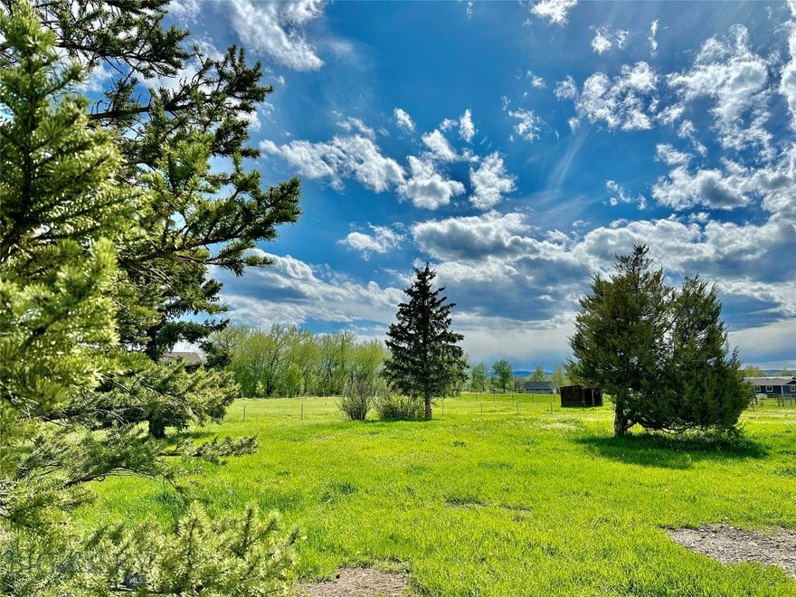 Live the country life at this pleasing 1.77 acres of vacant land convenient to Four Corners. A short drive down the country lane to a quiet rural residential neighborhood. Perfect spot to raise a family and let the kids play outside. Sunny location with established mature trees and shrubs. Minimal covenants allow for horses and hobby animals. Nice established fenced pasture, seasonal ditch, fencing and loafing shed for shelter. Location offers power, phone and natural gas. 4 bedroom residential septic permit approved by Gallatin County. Bring your home plans and pick a build site with mountain views. All information is deemed reliable, but not guaranteed; all buyers and buyers' agents to verify all information herein.