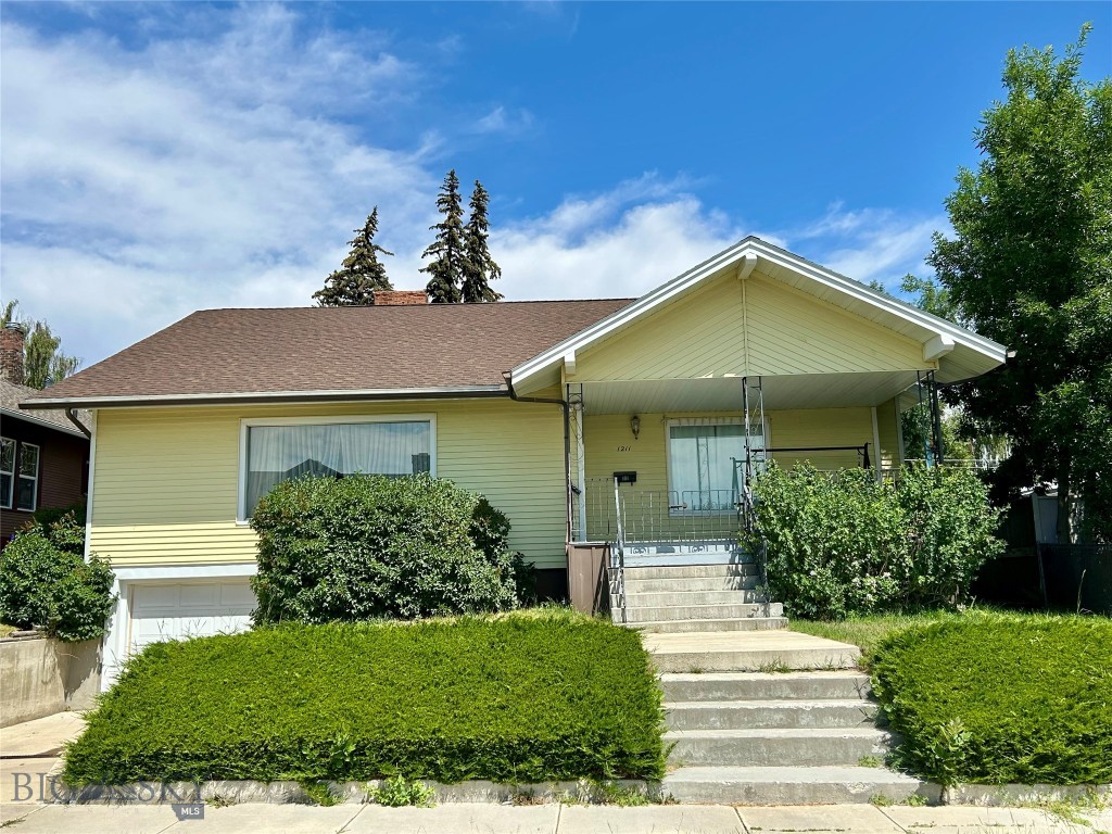 Discover a rare find in Butte’s sought-after West Side—a neighborhood cherished for its charm and tight-knit community. This well-built home offers endless potential, with a spacious layout featuring a bright front room with a beautiful brick fireplace, a dedicated dining area, and a cozy yet efficient kitchen ready for your personal style. The versatile basement includes garage space and an unfinished area perfect for storage, a workshop, or future expansion. Upstairs, the attic features a comfortable bedroom and additional flexible space just waiting to be transformed. With solid bones and a prime location in one of Butte’s most desirable areas, this home is a blank canvas for your vision—whether you want to refresh it as-is or customize it to perfection. Don’t miss this unique opportunity to own in a neighborhood where homes seldom come available! Schedule a viewing today!