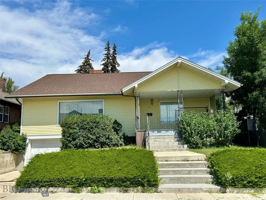 Discover a rare find in Butte’s sought-after West Side—a neighborhood cherished for its charm and tight-knit community. This well-built home offers endless potential, with a spacious layout featuring a bright front room with a beautiful brick fireplace, a dedicated dining area, and a cozy yet efficient kitchen ready for your personal style. The versatile basement includes garage space and an unfinished area perfect for storage, a workshop, or future expansion. Upstairs, the attic features a comfortable bedroom and additional flexible space just waiting to be transformed. With solid bones and a prime location in one of Butte’s most desirable areas, this home is a blank canvas for your vision—whether you want to refresh it as-is or customize it to perfection. Don’t miss this unique opportunity to own in a neighborhood where homes seldom come available! Schedule a viewing today!