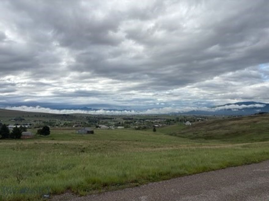 Enjoy breathtaking views from this beautiful 2-acre lot on the outskirts of Missoula! Featuring a gradual slope, perfect for a daylight basement design, this property offers the ideal setting to build your dream home. Just 10 minutes from Missoula, you’ll enjoy both convenience and the peace of Montana living.