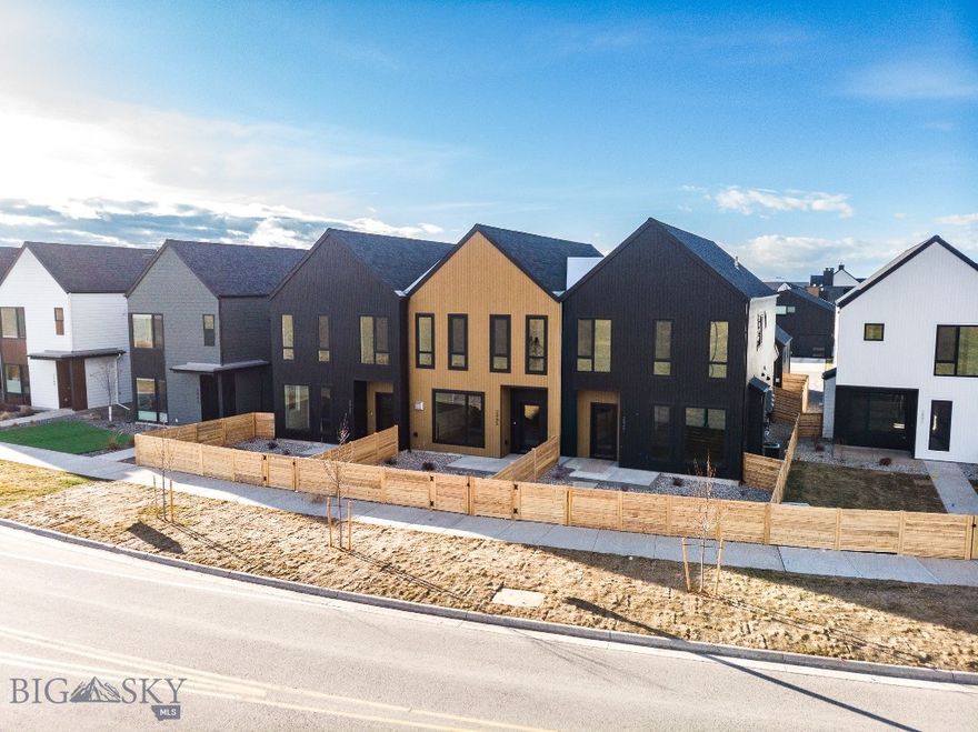 Where thoughtful design meets effortless Montana living—welcome to the newly unveiled Fika 3 condo at Gran Cielo-an exceptional, never-before-released design in the highly desirable Gran Cielo neighborhood. This brand new 2-story condo offers 2,039 sq ft of beautifully curated living space, complete with a rare fenced front yard and large covered patio for your outdoor entertaining (prewired for a hot tub/sauna). Step inside to a main level that balances style with functionality, featuring a spacious kitchen, large island, wood Lectus cabinetry, quartz countertops and an inviting living room with a gas fireplace. A powder bath, mud room with built-ins, and laundry room add convenience and flow to the main level, while Innotech euro-style windows fill the home with warm natural light. Central heat and air conditioning bring year round comfort. Upstairs, the layout continues to impress with a generous primary bedroom and en-suite bathroom, two guest bedrooms, a full guest bath, and an additional flex space perfect for an office, lounge, or play area. Modern, bright, professionally designed, and thoughtfully crafted, this new Fika 3 plan blends clean design with everyday comfort—an opportunity not to be missed in Gran Cielo.