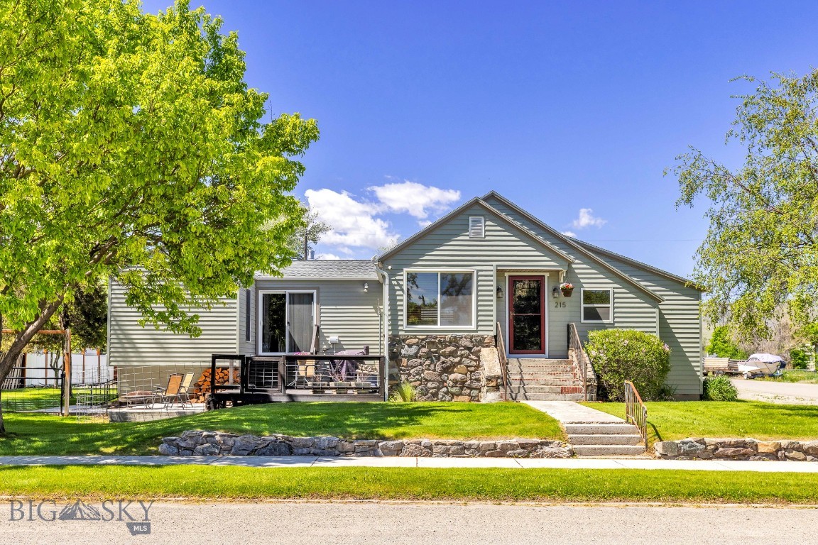 Charming Small-Town Living with Big-Time Amenities. If you're dreaming of small-town life with room to breathe and space to play, this property at 215 Oak is calling your name! Set on a beautifully landscaped corner lot, this home oozes curb appeal and offers an incredible blend of comfort, updates, and versatility. 4 bed/3bath. You'll love the fully remodeled kitchen, fresh flooring, and the comfort of central A/C installed in 2019. The roof was replaced in 2020. The finished basement features a non-conforming bedroom, a full bed and bath, and its own exterior entrance—ideal for a mother-in-law suite, guest quarters, or rental potential. What truly sets this property apart is the 28’ x 44’ heated shop with tall ceilings, perfect for car enthusiasts, hobbyists, or lots of gear. There’s also a large carport , plus a 16’ x 20’ garage. Spacious deck, perfect for relaxing summer evenings, and you've found a home that delivers the Montana lifestyle you've been waiting for.