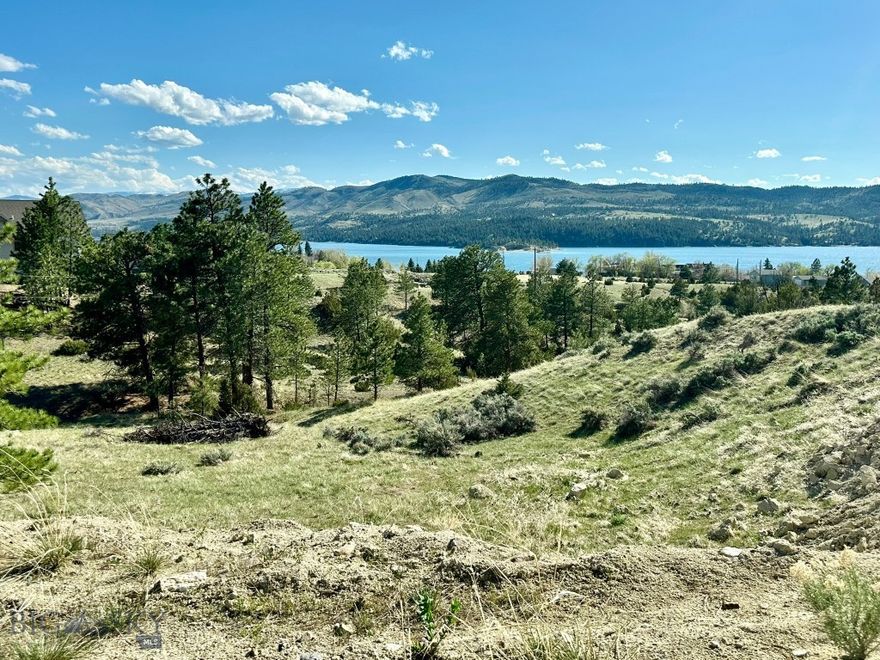 3.6 Acres with Canyon Ferry Lake Views – Investment or Dream Build Opportunity!
Rare chance to own 3.6 acres in Canyon Ferry Crossing with breathtaking views of Canyon Ferry Lake and surrounding mountain ranges. Located adjacent to Bureau of Reclamation land on the west side, this property offers protected land with no risk of development blocking your views.
• 360-degree mountain and lake views. 
• Road roughed in + build site started. 
• Adjacent to public land for privacy and open access.  
• Ideal for your custom home, or long-term investment. 
• Flexible land use with space for recreation and entertainment. 
Whether you’re looking to build your dream retreat or capitalize on an appreciating market, this property offers location, scale, and vision. Explore the value of lake-view ownership just minutes from outdoor recreation, boating, hunting, and more.