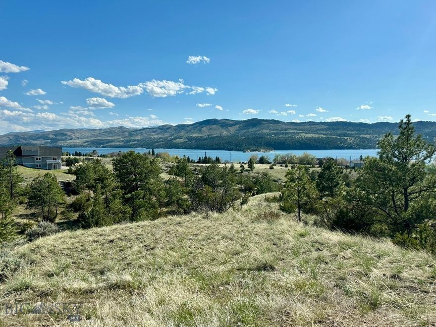 3.6 Acres with Canyon Ferry Lake Views – Investment or Dream Build Opportunity!
Rare chance to own 3.6 acres in Canyon Ferry Crossing with breathtaking views of Canyon Ferry Lake and surrounding mountain ranges. Located adjacent to Bureau of Reclamation land on the west side, this property offers protected land with no risk of development blocking your views.
• 360-degree mountain and lake views. 
• Road roughed in + build site started. 
• Adjacent to public land for privacy and open access.  
• Ideal for your custom home, or long-term investment. 
• Flexible land use with space for recreation and entertainment. 
Whether you’re looking to build your dream retreat or capitalize on an appreciating market, this property offers location, scale, and vision. Explore the value of lake-view ownership just minutes from outdoor recreation, boating, hunting, and more.