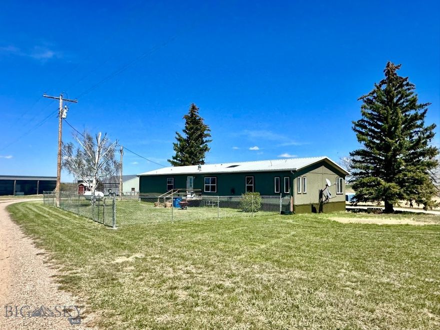 Located south of Ryegate off Highway 300, this 19+ acre property offers a ready to use setup in the heart of prime hunting and ranching country, within reach of Billings. The land is level, cross fenced, and includes corrals and a barn, making it ideal for horses or livestock. The manufactured home is on a permanent foundation and has been updated, providing a clean, move in ready living space. Mature landscaping creates a private setting, with a fenced yard for dogs and room to live comfortably. An old granary offers potential for a bunkhouse, guest space, or Airbnb. No covenants allow flexibility to build an arena or expand to fit your needs. A functional property with the improvements in place and the freedom to make it your own.