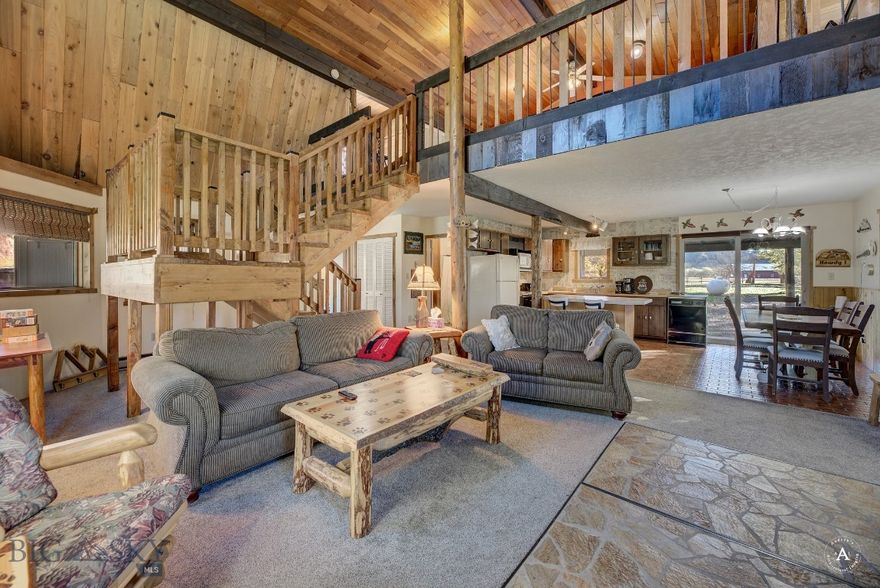 Missouri River Cabin Retreat | Income-Producing Property on 1 Acre
Experience the perfect blend of relaxation, recreation, and income potential with this exceptional cabin retreat on the Missouri River. Situated on a full acre, this fully furnished property offers privacy, comfort, and stunning outdoor living. Ideal for personal use, vacation rental, or both. Launch your drift boat or kayak right from your own back yard or enjoy a scenic float from Craig all the way home with your friends! The cabin is conveniently located within minutes of Craig, MT, considered the trout fishing capital of the world. It is a short drive to Holter Lake for more boating, swimming, and water activities as well as less than an hour from Helena, the State Capitol. Great Falls is a mere 40 minutes North for when it becomes necessary to grab more supplies for your stay. Enjoy seeing Bald Eagles, Osprey, Pelicans and waterfowl, Deer and Big Horn Sheep on a regular basis.
The main cabin features 2 bedrooms (one non-conforming), a spacious loft with 2 bunk beds, and multiple storage closets, making it perfect for hosting family and guests. With open living spaces and cozy gathering areas, there is plenty of room for entertainment. 
Above the two-car garage, you’ll find a private studio apartment with kitchenette, creating a second, fully functional living space—perfect for guests, extended family, or short-term rental income. Step outside to enjoy the hot tub, peaceful surroundings, and easy access to river recreation, fishing, and outdoor adventure. With two separate rentable areas, this property offers strong income potential alongside personal enjoyment. Come see Meadow Lane to appreciate its scenery and quaint charm.