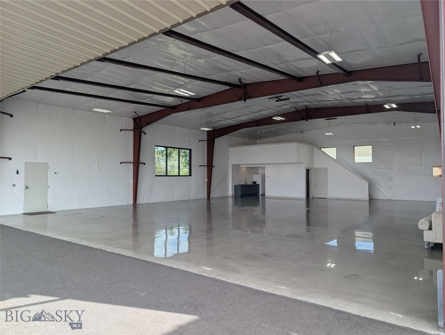 Tired of hangar rash and fighting for ramp space? Secure your spot at Bozeman Yellowstone International (KBZN) in a hangar so nice, you’ll be tempted to move in—and with a custom kitchen and tiled shower, you could theoretically live there—if it were permitted!

This 50x65 masterpiece features 16' sidewalls and a 46' x 13'4" bifold door that opens to an end-of-taxiway location with an unusually large apron (perfect for parking all your other "expensive hobbies"). Inside, it’s all creature comforts: radiant floor heat, Energy Star insulation, exotic granite, and a 235sf mezzanine for your office or "pre-flight" nap zone. Whether you need a fortress for your aircraft or an investment that’s in higher demand than a tailwind on a cross-country, this is it. Don't let this one depart without you.