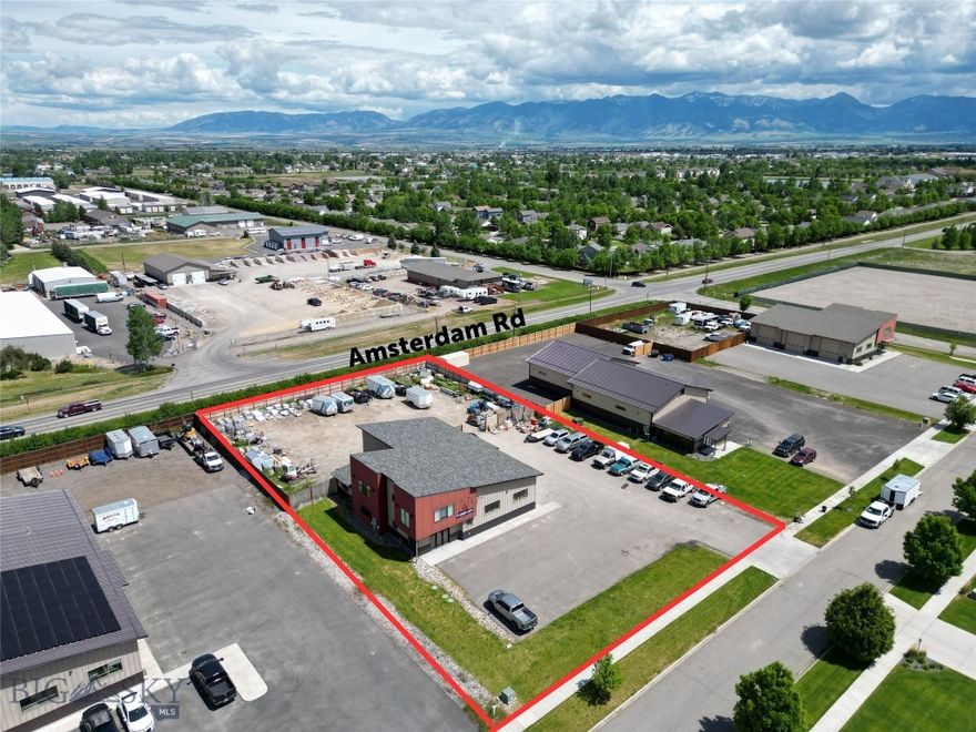 Desirable commercial building located on almost 1 acre lot offers additional area in the rear for storage or expansion. Centrally located with direct access to Belgrade traffic frontage and easy commute to Bozeman or connections to interstate it is an ideal location for the Gallatin Valley. Building features a combination of office space and enclosed oversized garages. Three 14 foot overhead automatic doors with 16 foot warehouse ceilings provide ample space. Main floor entry reception area with office, kitchen and full bathroom with shower. Upstairs is another office and a large conference room with vaulted ceilings.