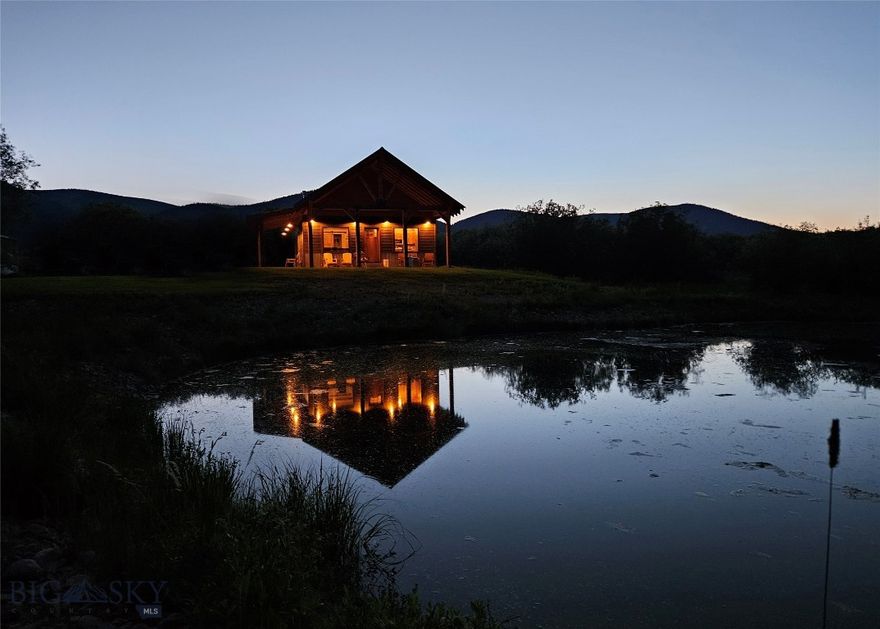 Whether you’re seeking a personal retreat, an investment opportunity, or a legacy property to enjoy for years to come, this pond-side mountain cabin delivers the Montana lifestyle at its finest. Tucked beneath the Pioneer Mountains, the property offers a rare blend of privacy and year-round access in the heart of Polaris, Montana—a true outdoor recreation mecca. Overlooking a small, peaceful pond, the land regularly attracts wildlife, with deer  and moose passing through and elk in the surrounding mountains.
Located just minutes from Maverick Mountain Ski Area, this cabin is the perfect base for skiing, snowmobiling, hunting, and ATV riding. Opportunities for fly fishing and endless trails are found throughout the area, ensuring an adventurous experience year-round.
After a full day of outdoor exploration, return to a warm, inviting cabin and unwind while taking in the peaceful beauty of Montana’s big sky country. Built in 2021, the 2-bedroom, 1-bath cabin offers 915 square feet of thoughtfully designed living space, complete with a 83-square-foot loft. Handcrafted details—including real hardwood floors and custom cabinetry—add character throughout the home.
A detached shop provides excellent space for gear, toys, and projects, enhancing the functionality of the property. The 5.77-acre lot offers ample room for a couple of horses or a small hobby farm. With its prime setting and close proximity to outdoor activities, the cabin also has excellent short-term rental potential, perfect for generating income while enjoying your own mountain escape.
Peaceful, private, and surrounded by nature, this cabin embodies the Montana lifestyle—quiet mornings, active days, and star-filled nights beneath the endless sky.