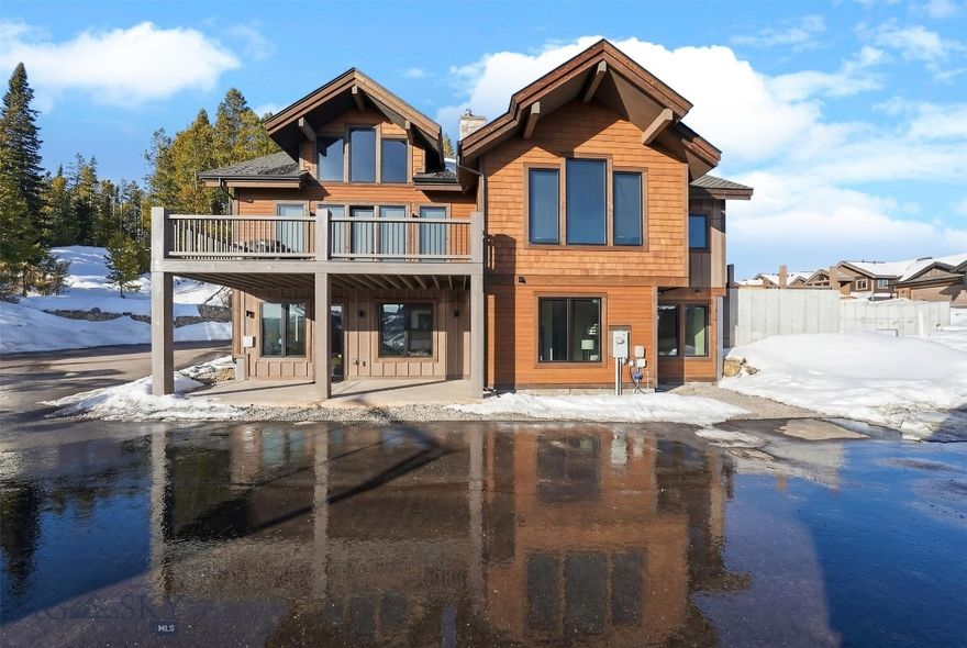 Experience true slopeside luxury at 17 Lower Cascade Ridge Road, a free-standing, ski-in/ski-out condominium offering the privacy of a single-family home with the ease of resort living. This new construction residence is fully furnished and thoughtfully designed across 3,292 square feet, featuring 5 bedrooms and 5.5 baths—ideal for hosting family and guests in comfort and style.
Soak in sweeping Lone Mountain views from expansive windows while enjoying high-end finishes, open-concept living spaces, and seamless indoor-outdoor flow. An attached one-car garage adds convenience, while the home’s freestanding design ensures enhanced privacy rarely found in condominium ownership. Ski in and out from the lodge, or directly from your unit!
Owners enjoy exclusive access to a staffed association lodge complete with a bar, pool, hot tub, fitness center, game room, and additional amenities, delivering a true resort lifestyle year-round. Whether used as a primary residence, mountain retreat, or luxury investment, this turnkey property offers effortless mountain living in a premier ski-in/ski-out setting.