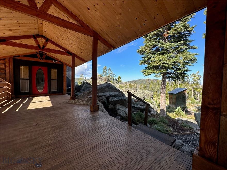 Are you tired of neighbors, reliable cell service (actually, there's good service), and the relentless convenience of a grocery store? Welcome to 31.02 acres of pure, unadulterated "leave me alone." This 4,480 square foot cabin masterpiece was hand-crafted over twenty years by a woodsman who clearly had a black belt in improvisation, resulting in more character in one ceiling beam than most suburban cul-de-sacs have in their entirety. While the original owner put in the love, the current owner—a motivated builder with a penchant for over-engineering—spent the last 3 years prepping this fortress for the apocalypse, or at least a very spirited winter. He’s performed an impressive facelift, tightening the construction and protecting the logs from the elements while beautifying the interior.

The fruit of his labor is your gain: the master bathroom is now complete, and the home boasts a brand-new metal roof with fresh plywood decking and an ice and water shield. The exterior has been sealed, siding repaired, and fresh concrete poured in the basement, garage, and around the foundation. You are essentially your own utility company now, thanks to top-of-the-line solar, a new generator, and 1,500 gallons of propane tanks. An actual electrical contractor updated the wiring, a licensed plumber handled the pipes, and a tankless propane water heater is ready to go. Even the driveway has been pampered with truckloads of gravel.

At 7,400 feet of elevation, you are closer to the eagles than the taxman. Access is "seasonal," which is realtor-speak for "bring a snowmobile or a very brave truck." You’ll find yourself 6.4 miles past where the county plows and another 3.75 miles past where the local hermits give up. There is no well, but a year-round stream provides water to a cistern and gravity-fed system during the warmer months, though you’ll want to pack in your own vintage of bottled drinking water. The neighbors consist mostly of elk, deer, bear, and moose who won't complain about your lawn height. Surrounded by Forest Service access and ripe for exploration, the hunting is phenomenal. If you are looking for a smart home where you can talk to your fridge, keep moving; but if you want a rugged, fortified, off-grid legend, the view from this picture window is calling your name. Cash only! Will not finance due to non-guaranteed access. Not for sissies.