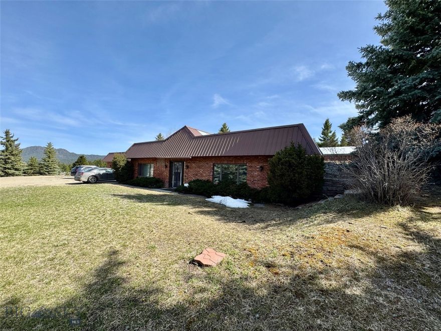 Tranquil Country Living Just Minutes from Town. 
Discover this spacious three-bedroom, three-bathroom home situated on 11.5 serene acres just south of town. Designed for comfort and versatility, the residence features two atriums that flood the interior with natural light, creating a warm and inviting atmosphere.?
A unique highlight of the property is the built-in swimming pool, currently covered, offering potential for restoration to suit your lifestyle. Surrounded by mature trees, the landscape provides both privacy and a picturesque setting.?
Equestrian enthusiasts and animal lovers will appreciate the ample space and existing fencing, making it ideal for a variety of animals. The majority of the property is fenced, ensuring safety and convenience.?
Additional features include a flat roof, offering architectural interest and potential for future enhancements. The garage boasts expandable walls, providing an opportunity to increase storage or workspace as needed.?
The property is equipped with an underground sprinkler system, simplifying lawn and garden maintenance.?
Experience the perfect blend of rural charm and accessibility in this exceptional property.?