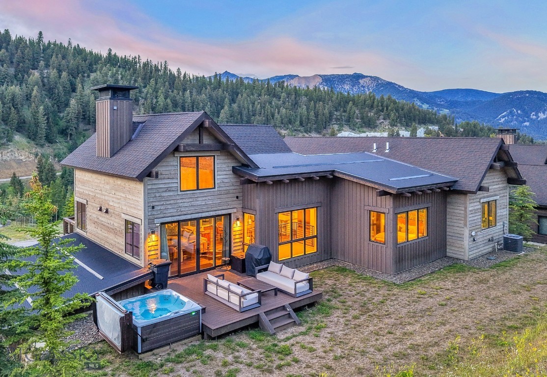 Experience the ultimate mountain lifestyle in this beautifully appointed 5-bedroom, 5-bathroom retreat located in the heart of Spanish Peaks Mountain Club. This move-in-ready residence offers effortless ski-in/ski-out access with a ski trail just across the street leading directly to the Highlands Chairlift — making first tracks a part of your daily routine.
Furnished by a talented local designer, every room showcases tasteful mountain-modern décor and thoughtful finishes. The open-concept kitchen, dining, and living area is flooded with natural light from abundant windows, while the lower-level family room—with a wet bar—offers the perfect setting for après-ski relaxation or entertaining. Multiple outdoor decks and a private hot tub area invite you to take in the surrounding views in every season.
Ownership includes access to the exclusive amenities of Spanish Peaks Mountain Club: private ski and hiking trails, two world-class golf courses (with golf membership), tennis and pickleball courts, state-of-the-art fitness centers, swimming pools, and elevated dining at the Clubhouse. Members also enjoy preferred access to the five-star services of Montage Big Sky.
Looking ahead, the soon-to-open Aspire Lodge — a 28,000-square-foot amenity center featuring a restaurant, fitness facility, basketball court, climbing wall, and two outdoor pools — will be just a short stroll from your front door, with completion anticipated in 2026.
Membership at Spanish Peaks Mountain Club is required upon closing. This is your chance to own a fully furnished, turn-key mountain sanctuary with unmatched access to recreation, relaxation, and luxury.