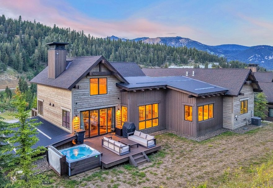 Experience the ultimate mountain lifestyle in this beautifully appointed 5-bedroom, 5-bathroom retreat located in the heart of Spanish Peaks Mountain Club. This move-in-ready residence offers effortless ski-in/ski-out access with a ski trail just across the street leading directly to the Highlands Chairlift — making first tracks a part of your daily routine.
Furnished by a talented local designer, every room showcases tasteful mountain-modern décor and thoughtful finishes. The open-concept kitchen, dining, and living area is flooded with natural light from abundant windows, while the lower-level family room—with a wet bar—offers the perfect setting for après-ski relaxation or entertaining. Multiple outdoor decks and a private hot tub area invite you to take in the surrounding views in every season.
Ownership includes access to the exclusive amenities of Spanish Peaks Mountain Club: private ski and hiking trails, two world-class golf courses (with golf membership), tennis and pickleball courts, state-of-the-art fitness centers, swimming pools, and elevated dining at the Clubhouse. Members also enjoy preferred access to the five-star services of Montage Big Sky.
Looking ahead, the soon-to-open Aspire Lodge — a 28,000-square-foot amenity center featuring a restaurant, fitness facility, basketball court, climbing wall, and two outdoor pools — will be just a short stroll from your front door, with completion anticipated in 2026.
Membership at Spanish Peaks Mountain Club is required upon closing. This is your chance to own a fully furnished, turn-key mountain sanctuary with unmatched access to recreation, relaxation, and luxury.