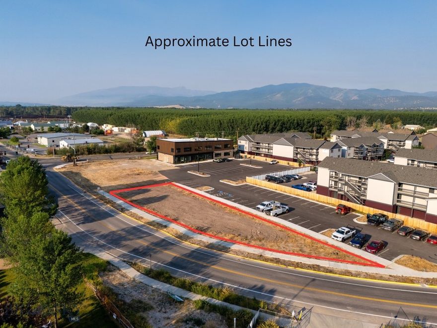 Prime Commercial Building Pad at Mullan Crossing Pad 3 is one of three commercial building sites located in the established and growing Mullan Crossing development—just across from Super Walmart and situated along Clark Fork Lane. This high-visibility location is ideal for professional offices, including medical, financial, or tech users. Pad 3 measures approximately 8,000 square feet and can support a building of up to 10,000 square feet. The site includes shared access to 102 parking spaces serving all three pads. Buyers may bring their own builder or work with the current owner, Walker Development, who offers build-to-suit services. With close proximity to First Security Bank, Super Walmart, and other major retailers, Pad 3 offers outstanding visibility, convenience, and long-term potential for owner-users or investors seeking a customizable commercial space in one of Missoula’s most active corridors.