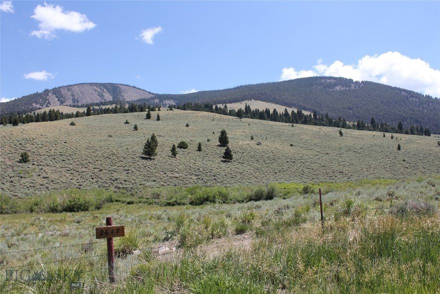 The beautiful 26.24 acre property is located on the Middle Fork of Little Sheep Creek.  If you are in love with the outdoors, this property is a dream come true.  Bordered on two sides by National Forest and in an area known for excellent hunting, camping, fishing and hiking, you are perfectly situated to walk off your property directly into hundreds of thousands of public acres.  The Lima Peaks are some of the most majestic in Montana and have a reputation for excellent elk and deer hunting.  Parcels like this are far and few between.