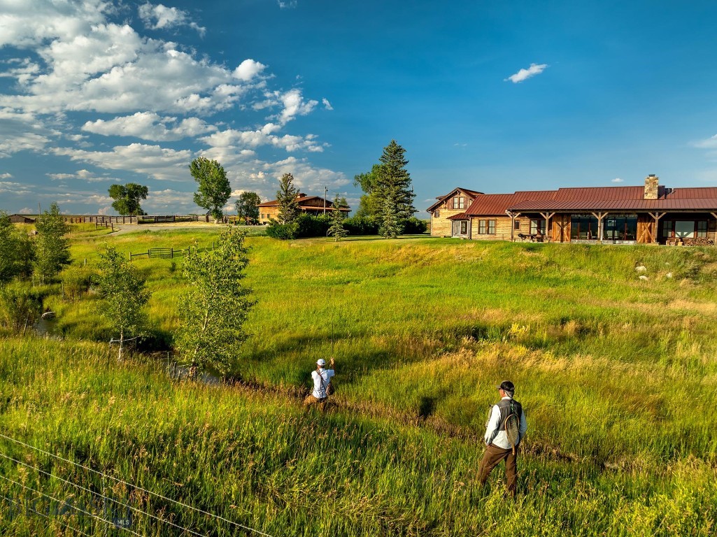 Nestled in the heart of Sweet Grass County, Cayuse Creek Ranch is a rare and exceptional offering in Montana’s rich ranching and sporting landscape. Spanning approximately 1,185± deeded acres, this well-balanced property lies just east of the charming community of Melville and only 20± minutes north of Big Timber. With easy access to Bozeman in under an hour and a half, it offers pristine natural beauty, exceptional recreational opportunities, and the practicality of a working ranch, making it a true legacy investment.
A cornerstone of the property is its impressive water features. Cayuse Creek meanders through the ranch for 2.2± miles—restored by professionals to enhance its wild trout habitat, water quality, and overall flow. It now supports a vibrant fishery, teeming with healthy populations of brown trout, some exceeding 20 inches. In addition, over a mile of meticulously restored spring creek offers another exceptional cold-water fishery, elevating the angling experience for fly-fishing enthusiasts.
Cayuse Creek Ranch improvements are tasteful, practical, and in harmony with the setting. The main residence is comfortable and welcoming, complemented by a newly constructed equipment shop and a beautifully updated rustic guest cabin. Views from the property are breathtaking, especially those of the towering Crazy Mountains, which provide a dramatic backdrop to the serene ranch setting.
With strong water rights supporting prolific grass growth, the ranch currently accommodates 500 bred yearlings seasonally. Unencumbered by a conservation easement and bordered by nearly 0.7± miles of state land, Cayuse Creek Ranch presents an unparalleled opportunity to own a productive, scenic, and recreationally rich property in one of Montana’s most iconic regions.