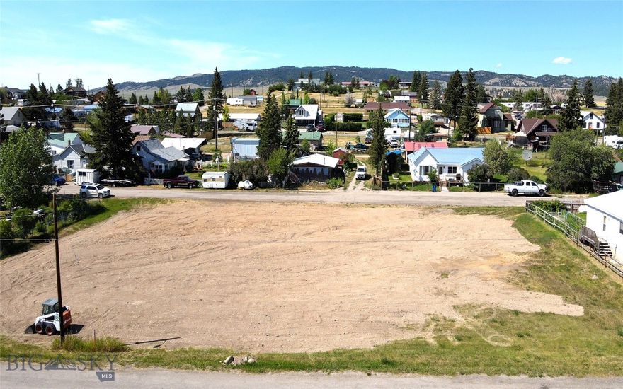Prime Real Estate Opportunity: 5 in town lots- Located in a sought-after area, the town of White Sulphur Springs. 
This listing offers 5 connected city lots totaling just over half an acre, perfect for residential development, multi-family units, or as a long-term investment, these lots offer unmatched potential. This is an exceptional opportunity to acquire land in a growing community with easy access to shopping, dining, and the school.