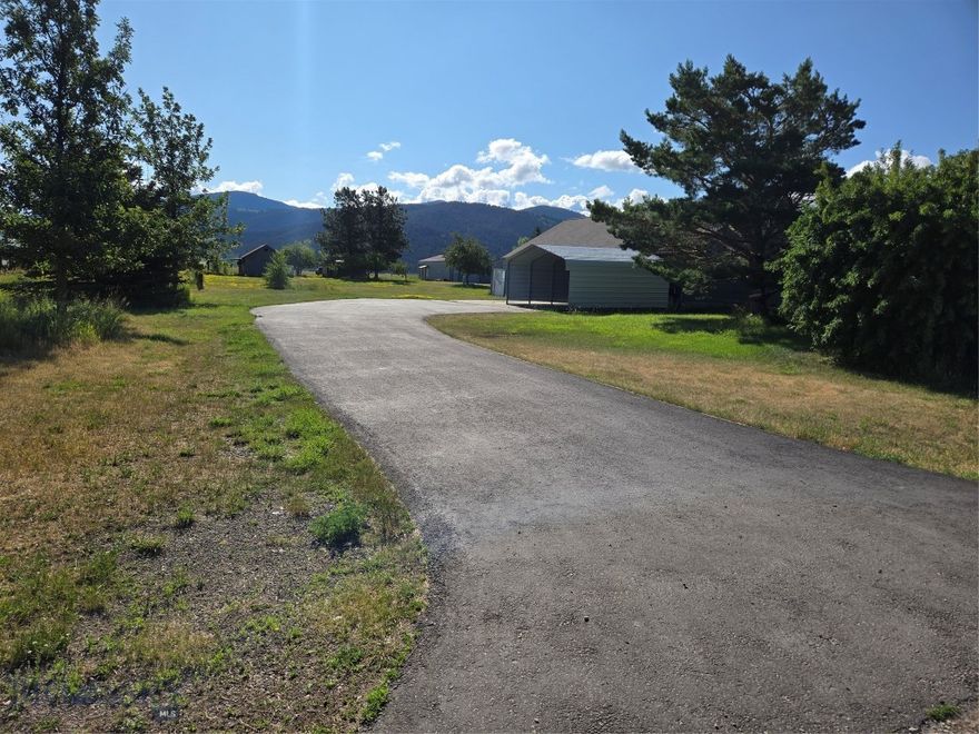 wonderful 7.48 acres with phenomenal views of the valley and surrounding mountains.  A peaceful private retreat at the end of the road, away from the hectic pace in Bozeman, yet less than 15 minutes away. Improvements occupy approximately 1.5 acres at the front, and the rear pasture/hay ground is approximately 6.0 acres fully fenced.  Leverich Road is a well improved private road which serves the adjacent mini-ranch properties to the north. Adjoining to the south is 18+ acres owned by the City of Bozeman and is used to carry Hyalite Creek waters to the treatment plant several miles to the east.  it is park-lite, hayed yearly with a walking trail across it.  Lands to the east and farm ground.  The property contains a 3 bedroom, 1 1/2 bath, 1800 sqft home which could e enlarged or remodeled, used as a accessory building, or it possibly could receive approval to use rt as a guest house and a new home constructed. The current zoning is one home er 5 acres and changes or additions are subject to County Planning approval.  Additionally, these is a 1200 sqft metal storage/shop with horse stalls, well, septic system, trees and landscaping.