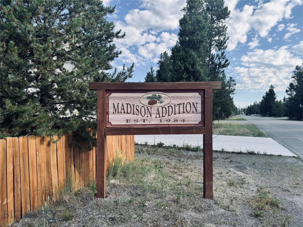 Very nice treed lot in the Madison Addition to West Yellowstone. Within the city limits with all city services.