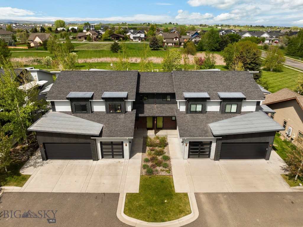 Welcome to this well-appointed fourplex situated in a prime location in Bozeman’s Cattail Creek neighborhood. Each unit features a spacious and functional floor plan with 3 bedrooms, 2.5 bathrooms and ample living, kitchen and dining spaces. Each unit also includes a garage, a cozy fireplace, and a covered back patio perfect for enjoying the peaceful setting. The backyard opens directly to neighborhood trails and open space making outdoor activities easy and convenient. Residents can enjoy a neighborhood park, basketball court, playground, and trails and bridges that wind past ponds and scenic spots throughout the area. All units are currently rented keeping pace with the strong rental history of this property. Convenience is key at this location. Situated behind popular shopping centers such as Costco and Target with North 19th just minutes away, you'll have easy access to daily necessities. Interstate 90 is also nearby, offering plenty of convenience for commuting or exploring all Bozeman has to offer. Curb appeal and plenty of parking are added bonuses. Don’t miss the chance to explore the opportunities this unique Bozeman property has to offer.