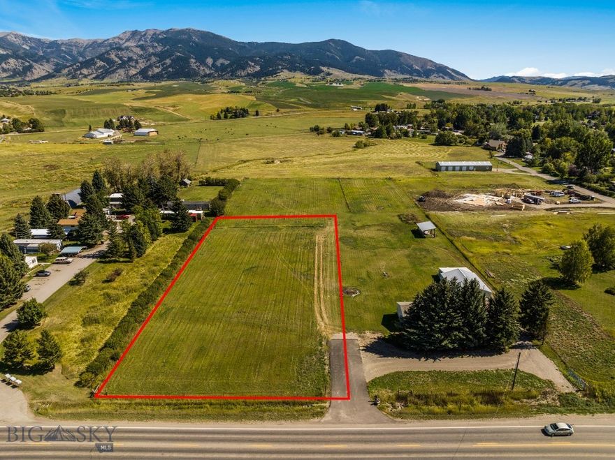Secure your piece of Montana paradise in one of Bozeman’s most sought-after corridors. Located just over a mile down Springhill Road, this 1.556-acre parcel offers the rare combination of privacy, convenience, and true build-ready infrastructure, saving you months of time and upfront development costs.

The property features a fully approved 0.222-acre building envelope, with well and septic permits already in place, setbacks surveyed, and utilities, including power and natural gas - stubbed to the lot. The build envelope is flat, level, and ready for your custom home or home + shop.

Outdoor recreation is right at your doorstep with Sypes Canyon Trailhead nearby, East Gallatin River fishing access less than ½ mile away, and Riverside Country Club & Bridger Creek Golf Course just down the road.

Floodplain & Build Area Note:
A portion of the property lies within the 100-year floodplain, creating a natural greenbelt that enhances privacy and open space. The approved 0.222-acre building envelope is fully permitted for residential construction. Expansion beyond this footprint may be possible with a Gallatin County variance.

This is a rare, shovel-ready opportunity in the Gallatin Valley - offering views, utilities, permits, and location without the typical hurdles of raw land.