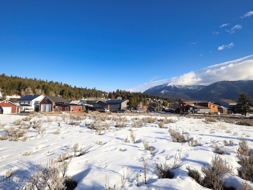Nestled within the heart of the Meadow, this exceptional parcel of land spans approximately 0.32 acres and is positioned in the most sought-after neighborhood, offering a rare opportunity to create your mountain dream amidst the backdrop of unparalleled beauty. Situated on a coveted corner lot, this property boasts a flat topography and is further heightened by its prime location within walking distance to the vibrant heartbeat of Town Center and Westfork Plaza. Whether you're seeking a personal retreat, an investment opportunity, or a blend of both, this parcel offers the ultimate canvas for realizing your aspirations amidst the splendor of the Rockies.