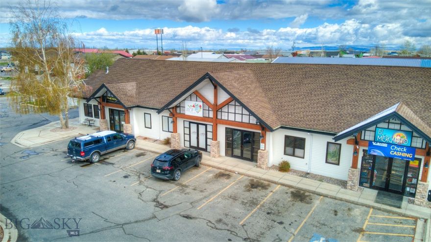 This bright, modern space is ±1,149 square feet, and features an open floor plan with tall ceilings, a kitchen, a private restroom, and one room for extra storage or an office if desired. Additionally the space has permissive commercial zoning, allowing for a variety of potential uses. Capture Bozeman Yellowstone International Airport traffic, Big Sky Resort-bound visitors, and a local commuter audience at this high-profile location in Gallatin County. Triple Nets (NNN) are estimated at $5.00 per square foot per year, making this an attractive option for businesses seeking a prominent location in Four Corner’s rapidly growing commercial environment.