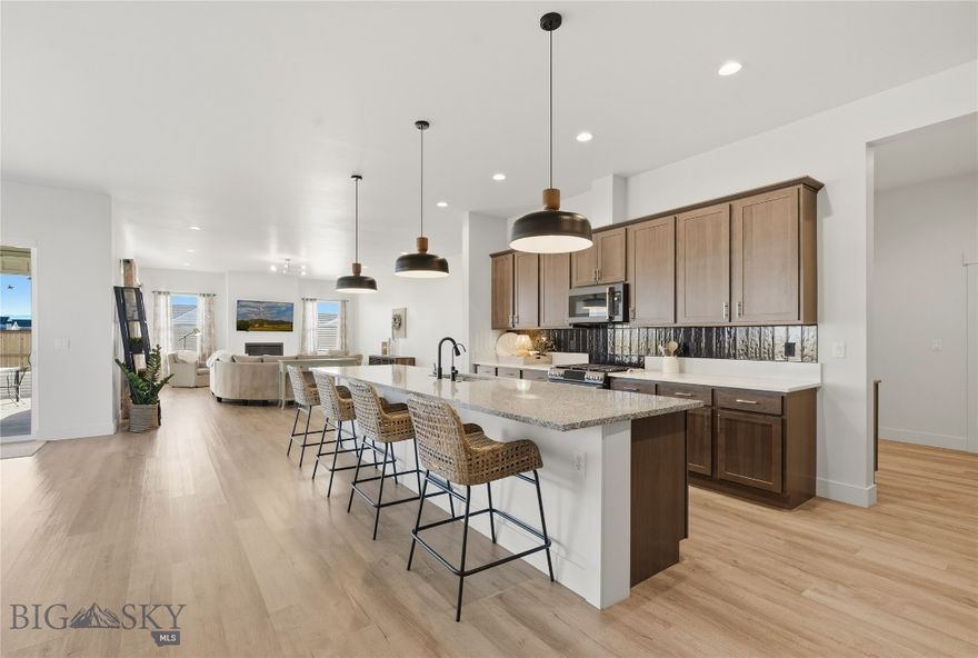 Tucked at the end of a quiet cul-de-sac on a dead-end street in Prescott Ranch, this 2021 Craftsman offers 2,825 sq ft of single-level living with a smart, privacy-forward layout. The open-concept living, dining, and kitchen area is bright and welcoming, anchored by a gas fireplace and designed for easy entertaining. The kitchen delivers with a gas range, Café appliances, reverse osmosis to the sink and refrigerator, and ample prep space for everyday living.

The oversized owner’s suite is positioned to overlook the backyard and feels like a true retreat, featuring a stunning bathroom and a generous walk-in closet. At the front of the home, a junior suite provides ideal separation for guests or multi-generational living. A third bedroom sits adjacent to a full bathroom with a shower, creating a flexible setup for an office, home gym, or additional guests.

Outside, enjoy a covered patio with a hot tub hookup and a gas stub ready for a grill, plus lawn, underground sprinklers, partial fencing, and mountain views. Additional highlights include central A/C, forced-air gas heat, and a 3-car attached garage. Neighborhood amenities include parks, a playground, and sidewalks. A small one-way side lane runs behind the property.