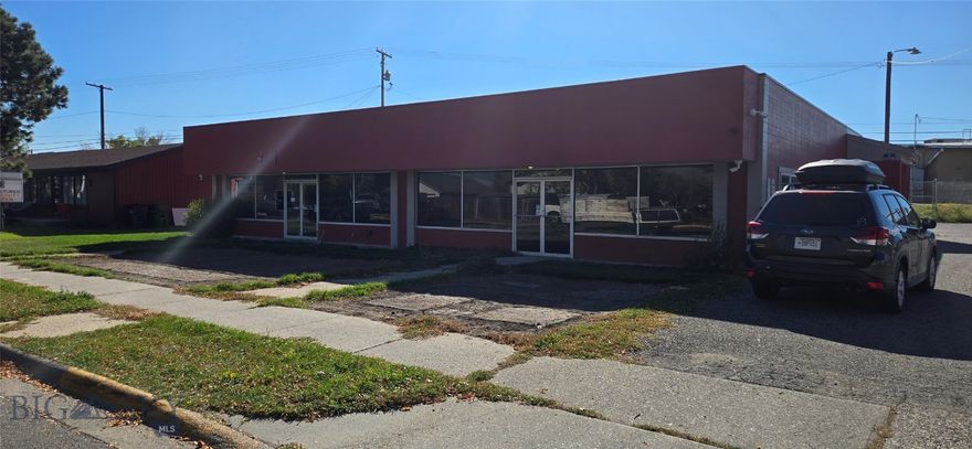Unique Opportunity in Prime Central Bozeman Location!

This B2-zoned property offers exceptional flexibility and investment potential in the heart of Bozeman. The building consists of approximately 3,904 square feet (per tax records) and can be divided into two separate spaces, each with independent gas and electric meters, making it ideal for multiple tenants or mixed-use concepts.

The property features dual-zone hydronic heating, two bathrooms, a kitchen area, and an additional bonus room. The rear of the property is fully fenced, providing added functionality and privacy.

Located within the B2 Community Business District, this property supports a wide range of retail, commercial, and office uses. Residential units are permitted on upper floors only, while development of a standalone multi-household residential building would require special approval from the City Commission.

Recent city zoning updates further enhance the value and development potential of this site, positioning it as a strong candidate for a multistory mixed-use project and a compelling long-term investment.

The seller is currently renovating the property, and buyers may have the opportunity to select paint colors, flooring, and other finishes, depending on timing.

Contact the listing agent or your favorite REALTOR® to schedule a showing and explore the possibilities this unique property has to offer.