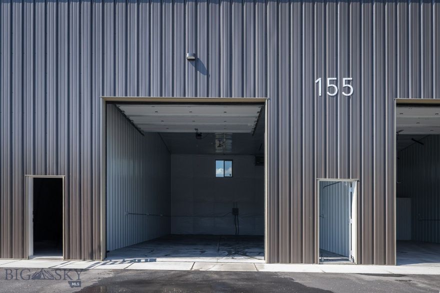 Commercial condo, new construction. Located on the highly sought after Jackrabbit corridor between Belgrade & Four Corners on the way to Big Sky. Easy in and out access off of Jackrabbit lane. Five minutes to the Bozeman Airport. 14' x 14' overhead garage doors with electric openers, 6" concrete slab, option for mezzanines in back third of units, ceiling height is 19'-11" in front & 16'-3" in the back, Energy Saver Systems insulated walls R-25 and R-40 ceiling fiberglass insulation, Steel siding on side interior demising walls, This unit does not have a bathroom and is not permitted for a bathroom, concrete floor French drain in front third of bays, 48" x 48" sliding window up high, 3' x 7' walk through door with dead bolt, ceiling hung gas unit heater, fully paved lot & entrance off of Jackrabbit lane. Gated entrance with 6' chain link fence with barbed wire top around perimeter. Great heated units for Collector cars/vehicles, RV/ Boat storage, small businesses, hobby/workshop, furniture, storage. Due to State law no marijuana businesses are allowed, covenants do not allow engine shops, mechanic shops, all businesses need approval from Condo Association, no outside parking of equipment or trailers. Additional covered 40' x 12' x 14' storage units available to rent in another building for trailers or vehicles. Association fees are $350/ year with a one time "in Reserves" setup fee of $350, covers snow plowing, weed control, insurance, grounds keeping. Seller is a licensed Realtor in the State of Montana.  All listing information provided is deemed reliable, however Buyer/Buyer's agent should verify by performing their own due diligence.