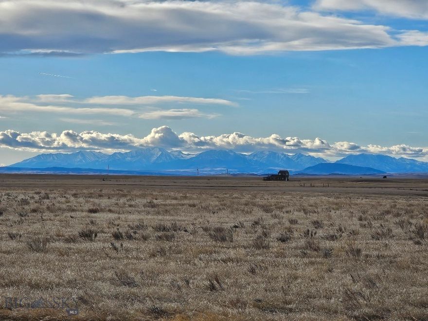 Year 'round access, county road, power,  and seller financing! 21.6 acres with county road frontage on 2 sides. Power and fiber optic line on site. Corners on a square mile of State Land. Good pasture/gras for animals. 360 degree mountain views include Crazy Mountains, Little Snowy Range, and Bearooth Mountains. Deadman's Basin Reservoir is only about 10 minutes from this property. The reservoir is stocked with tiger muskie for sport fishing!