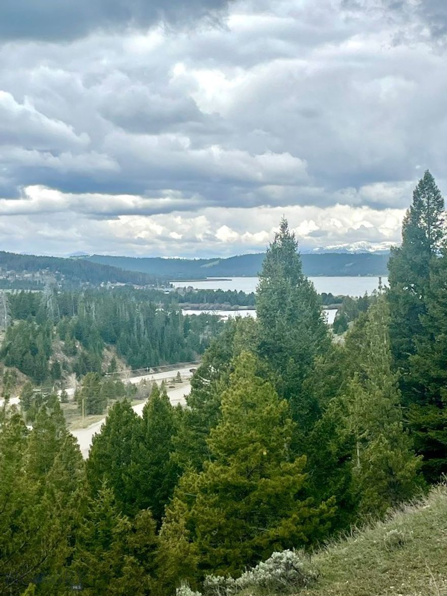 Prime opportunity to own a 2-acre buildable lot just above the shores of Georgetown Lake in Montana. This lake view property offers year-round access, stunning mountain and lake vistas, and unmatched privacy—ideal for building your dream home, vacation getaway, or short-term rental cabin. Outdoor lovers will appreciate direct access to hiking, mountain biking, big game hunting, and world-class fishing on Georgetown Lake, which is also a hotspot for ice fishing in the winter. Discovery Ski Area is just 15 minutes away for downhill skiing and snowboarding. Centrally located, the property is 30 minutes to Anaconda, 20 minutes to Philipsburg, and 45 minutes to Fairmont Hot Springs Resort with golf, dining, and spa amenities. Special use permits allow for tourist homes and nightly rentals, offering strong investment potential in Montana’s highly desirable recreational corridor. Whether you're looking for a mountain escape or income-generating land, this Georgetown Lake property checks all the boxes. **Check out the video to see drone shots of the area.