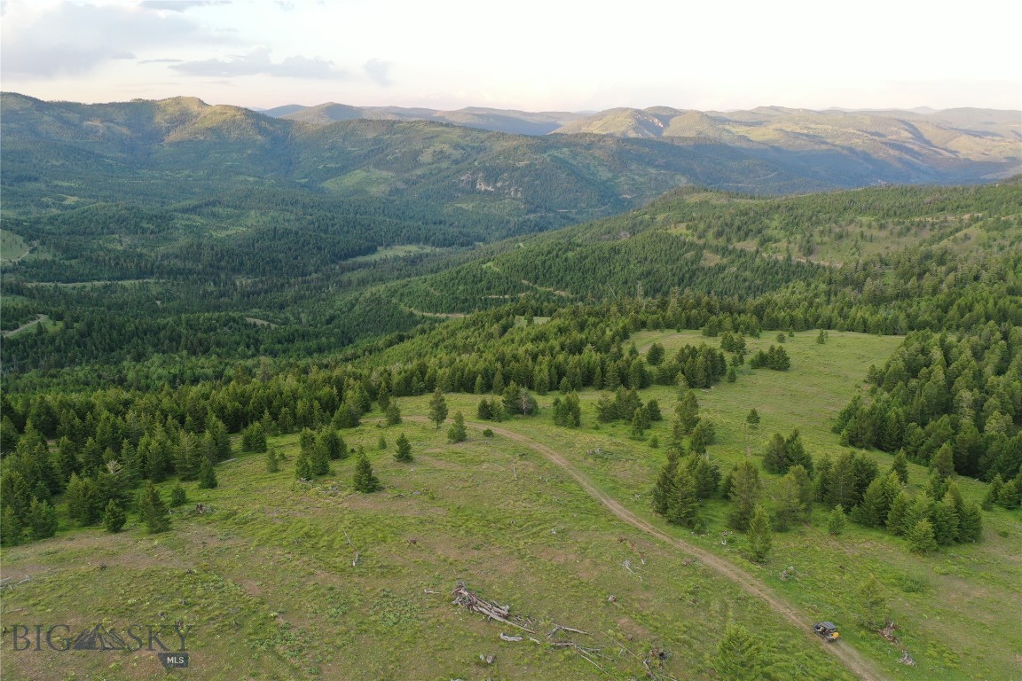 153.53+/- acres –Near Drummond Discover your own private slice of Montana, nestled in the scenic Garnet Mountain Range. Surrounded by mountain views, open meadows, sloped terrain, and expansive acreage, this property offers the perfect setting for those seeking a secluded getaway, seasonal homestead land, recreational retreat, or wildlife haven. Whether you're looking to buy land in Montana for recreation, investment, or to build your off-grid cabin, this rural property checks all the boxes. It’s also ATV-friendly, making it easy to explore the land and enjoy the rugged Montana terrain. Watch elk, deer, and other native species roam freely across your private acreage—making it a prime option for hunting land for sale in Montana. The property offers seasonal gravel road access and has no known covenants. Don’t miss your chance to own a piece of Montana mountain land—your personal seasonal recreational retreat.
