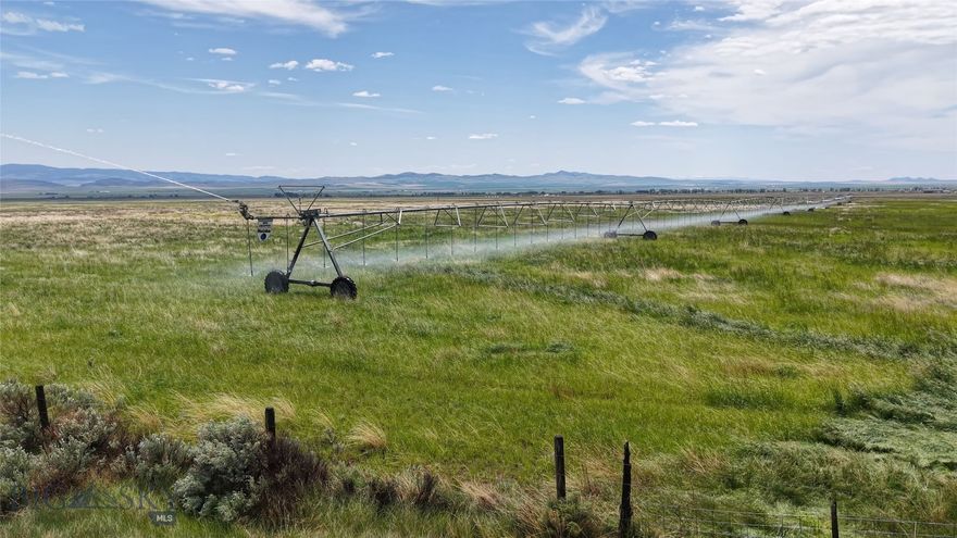 Motivated Seller! Recently reduced by an additional $1,000,000 and now including the newly added 320 acre Crow Creek BLM grazing lease. Discover the unique potential of this 480± acre gravity-fed irrigated ranch and nearby 320 acre BLM grazing lease bisected by Crow Creek.  With deeded acreage and leased ground located just 5 miles apart, this offering is the perfect opportunity to add production to your ranching operation. With the addition of the BLM grazing lease, this property benefits from an additional 86 AUMs from June-October. 

Located only 45 minutes to both Bozeman and Helena, properties of this scale and proximity to major Montana cities are a rare find. Currently equipped with three newly installed Reinke pivots, Toston Pivots boasts highly productive hay and pasture ground. Multiple building sites are available across the property, each offering sweeping views of the valley that will captivate custom-home clients. The ranch attracts an array of wildlife, including elk, mule deer, antelope, and upland birds, thanks to its position as the nearest irrigated land to the Elkhorn Mountains. 

Water resources make Toston Pivots especially valuable. With solid water rights and a gravity-fed supply from Crow Creek, water delivery is efficient and irrigation costs remain low. This setting is ideal for cattle and horses, offering ample grazing land throughout the season. The deeded acreage also presents opportunities for customized food plots with alfalfa, sainfoin, and other perennials that attract local wildlife. Nestled along the eastern foothills of the Elkhorn Mountains, the property affords panoramic western views and stunning sunrises over the Big Belt Mountains. The property is bordered by well-maintained county roads allowing for easy access for outdoor enthusiasts. Thousands of acres of BLM and Forest Service land are accessible within a mile, eliminating the need for trailering and maximizing recreational freedom.