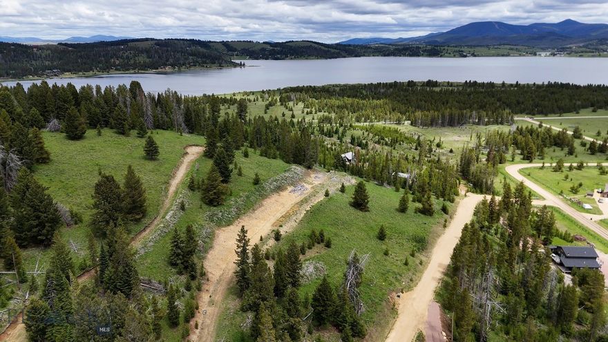 Rare to the market - Georgetown Lake retreat lot. This 2.04± acre offering with majestic trees, views of the lake and the surrounding mountains are hard to find. Georgetown Lake is inviting to part time and full time residents for all things recreation. Enjoy boating and water skiing in the summer as well as ice fishing in the winter. Convenient to Discovery Ski Area, Philipsburg and Anaconda. Build your dream home and enjoy watching the wildlife and the sunsets on the lake from your deck. This lot borders Forest Service on the back side, great hiking and mountain biking. They are on a community water system and power is to the lots. Video/Some photos are from all 4 lots.