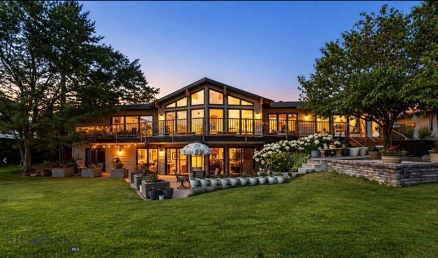 Located on the 10th hole of the Yellowstone Country Club Golf Course, this stunning home blends timeless design with modern luxury. Inside, European white oak herringbone and bamboo hardwoods pair with vaulted ceilings, timber beams, and floor-to-ceiling windows showcasing sweeping golf course views. The newly landscaped yard and an expansive south-facing deck, rebuilt in 2025 and accessible from the kitchen, family room, and primary, offer the ideal setting for sunsets and entertaining. Featuring 5 bedrooms and 4.5 renovated baths with quartz or marble countertops, heated towel racks, and designer finishes, the main level includes two bedroom suites, one with dual baths and closets. The walk-out basement boasts a large family room, workout area, and 3 spacious bedrooms, two with direct golf course access. Info deemed reliable but not guaranteed. Buyer/buyer agent to verify.